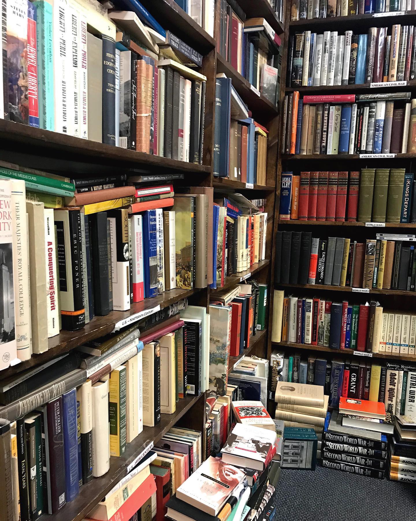Cluttered bookshelves